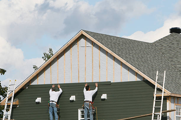 Professional Siding technician working in Bristol, FL